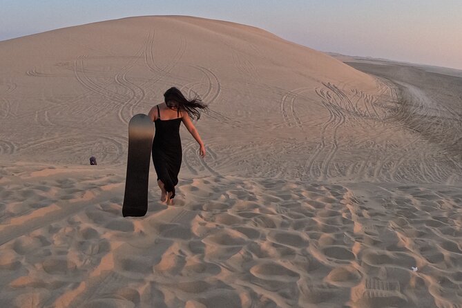 Half Day Night and Morning Desert Safari Camel and Sand Boarding - Dune bashing and sand boarding near the desert peaks