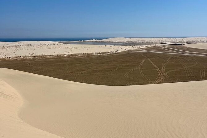 Private Desert Safari Tour 4 hours - Sandboarding on golden dunes