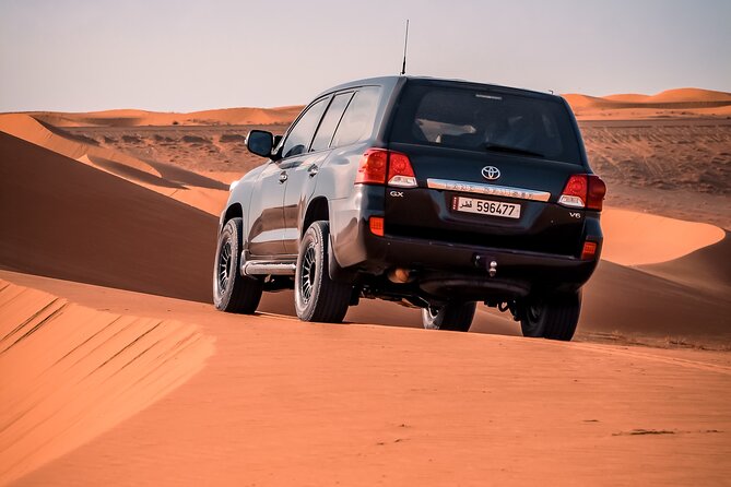 Private Doha Desert Safari and Inland Sea Tour, Best adventures - Sandboarding, camels, and quad bikes