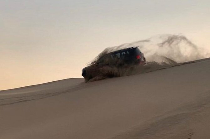 Private Dunes Bashing | Desert Safari | Sand Boarding - Sand boarding and the activity mix