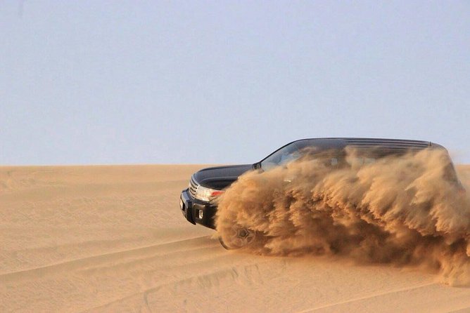 Qatar Desert Safari Adventure Experience . - Sealine Beach and the start of the dunes