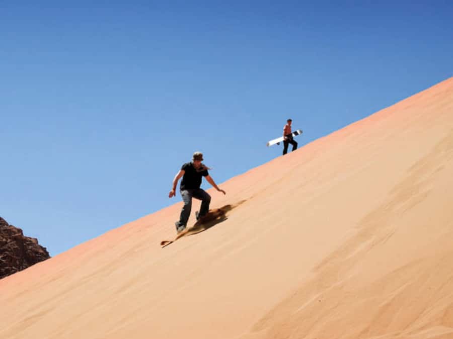 Qatar Desert Safari, Quad bike, Camel Ride and Sandboarding - Sandboarding and photos at the Inland Sea