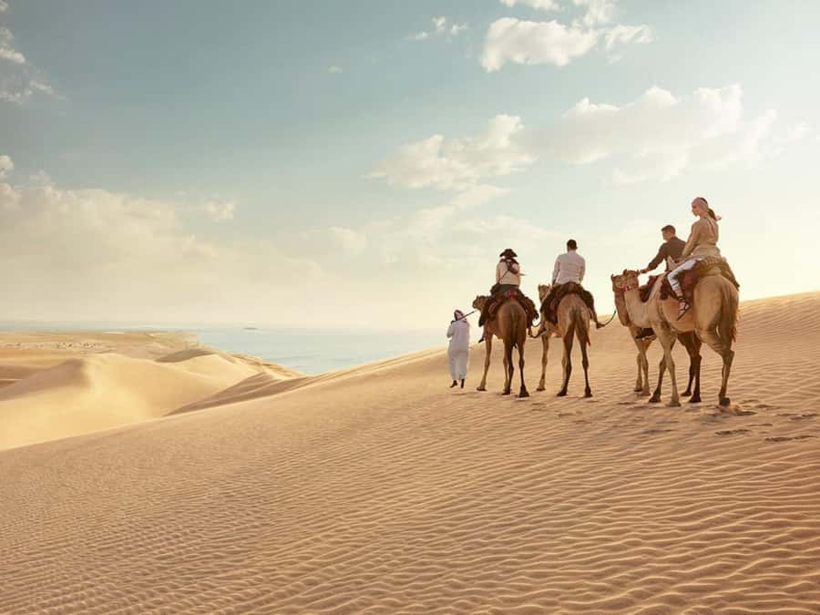 Qatar Desert Safari, Quad bike, Camel Ride and Sandboarding - The guide can shape the whole outing