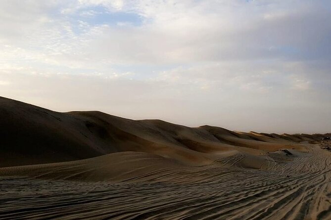 Qatar Sunset Desert Safari: Dune Bashing & Golden Sands Adventure - Sunset at Khor al-Adaid and the Saudi border