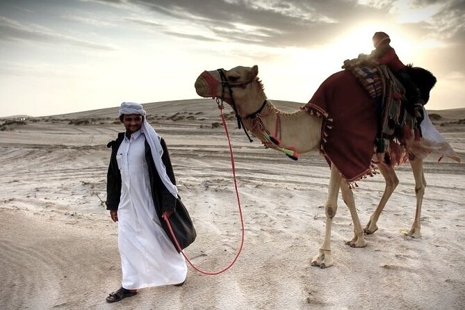 Thrilling 4-Hour Dune Bashing & Camel Ride Safari to Inland Sea - A short camel ride at the local camp